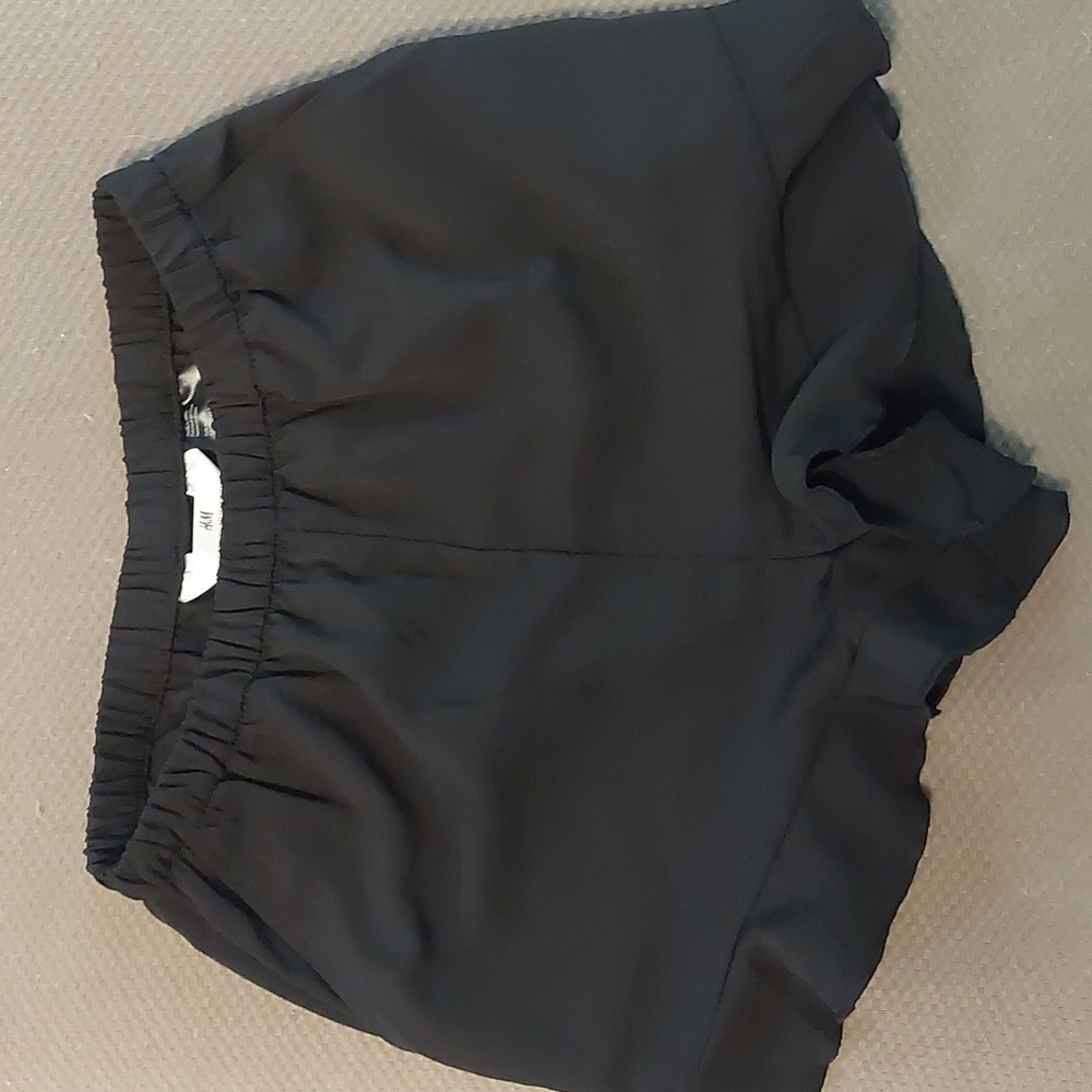 Girls H&M black ruffle shorts size 12/14